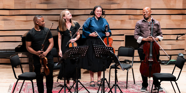 JPO's Kabelo Motlhomi, Carli D'Alebout, Lynne Daphne Rudolph and Daliwonga Tshangela at Wits VC annual concert 600x300
